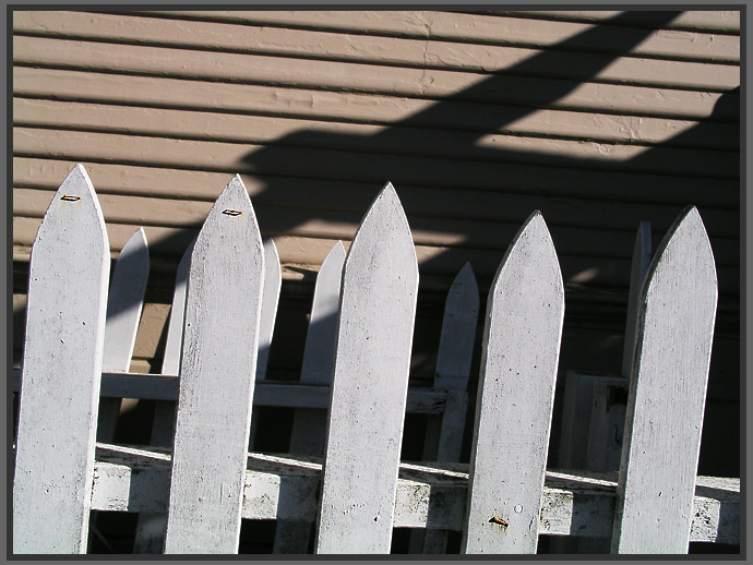 old fence against wall