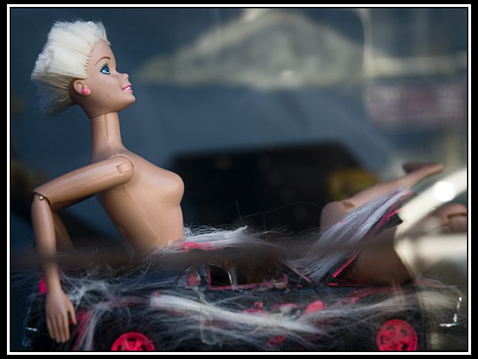 doll in store window