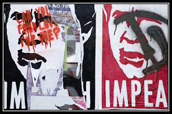 torn poster w/grafitti icon