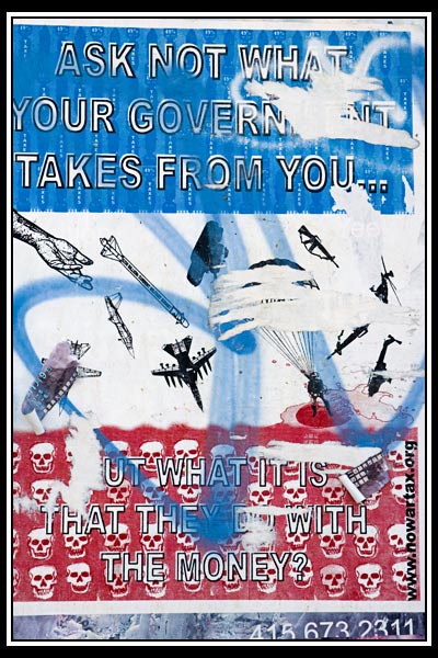 torn poster w/grafitti