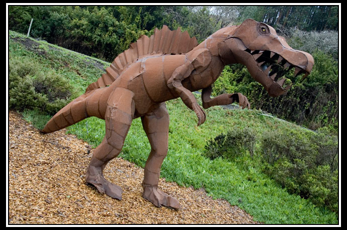 dinosaur on the road